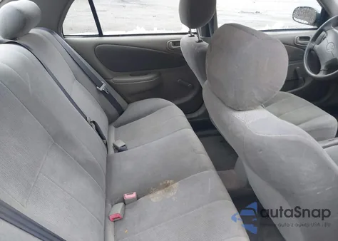 2002 Toyota Corolla Ce из США, поврежденный, VIN 2T1BR12E72C533307